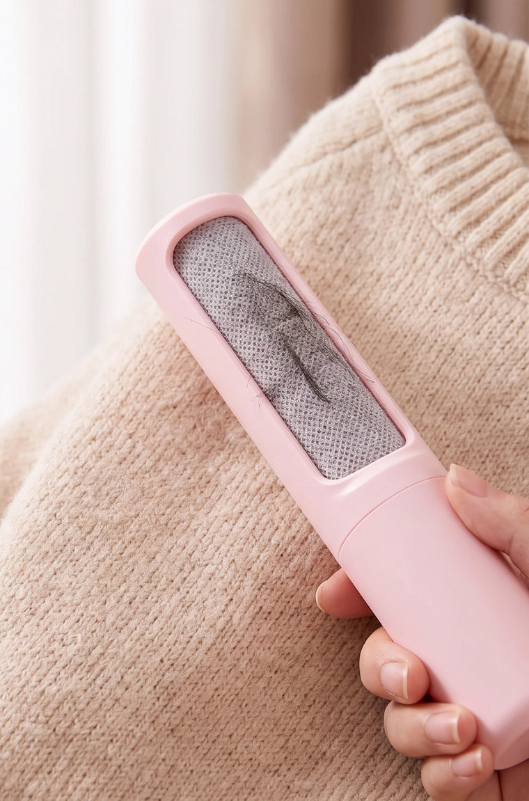 The collected hair inside the PAWOZA Clean brush chamber after cleaning the sweater